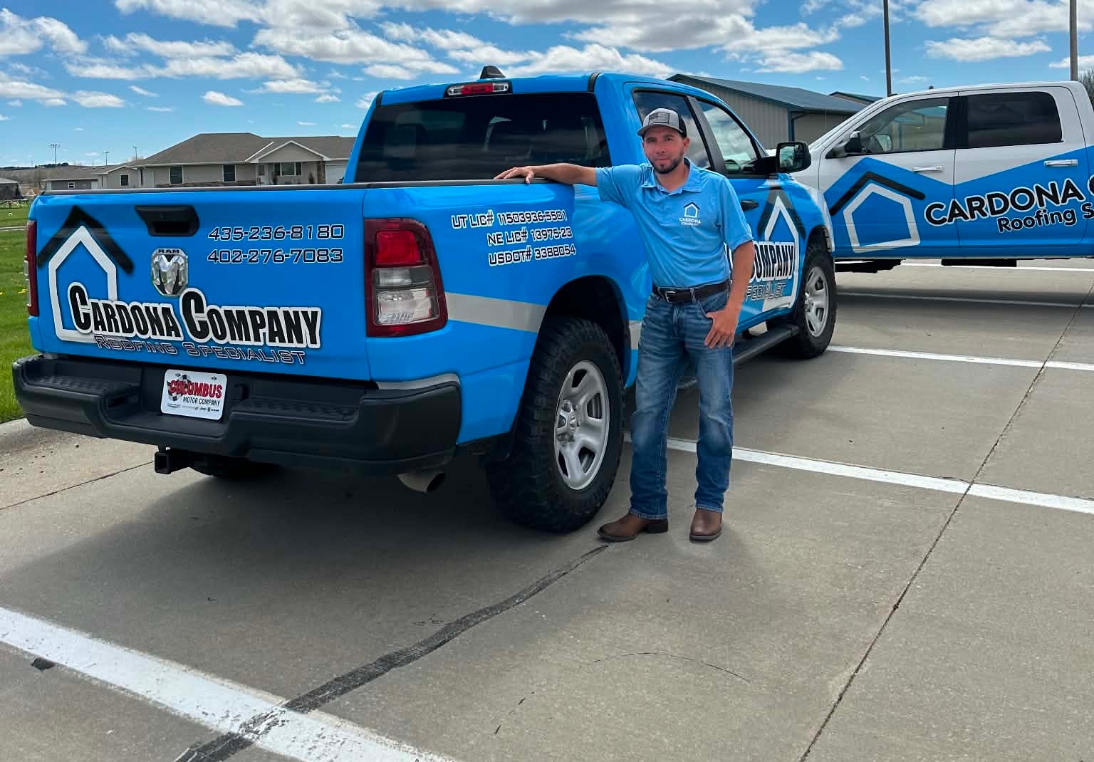 Gustavo Cardona, Owner & Founder at Cardona Company, beside a branded Cardona Company truck